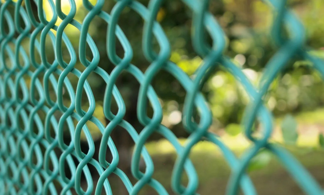 Affordable chain-link fence with privacy slats installed in Eagle Mountain backyard